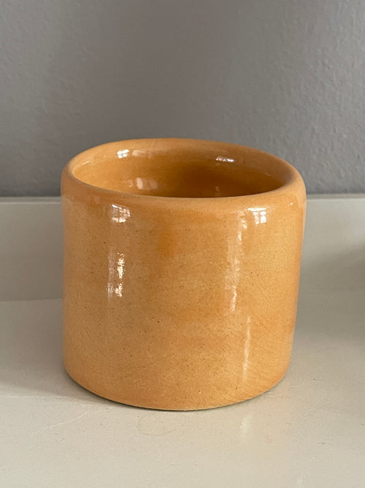 Small tangerine hand built vase